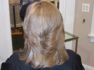 blond dimensional highlight flipped out long layers haircut